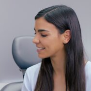 A female dentist talking to a female patient about Ivoclar's Professional Teeth Whitening product range