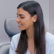 A female dentist talking to a female patient about Ivoclar's Professional Teeth Whitening product range